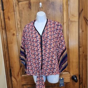 Democracy size 1X blouse vibrant with tie front and flag sleeves